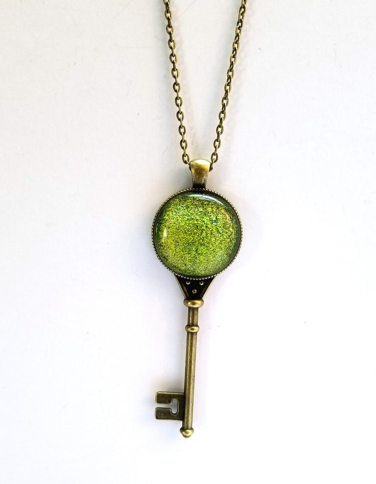 Antiqued Brass  Skeleton Key pendant necklace with Fused Glass Green Dichroic cabochon on 24 inch brass plated chain jewelry seeds glassworks