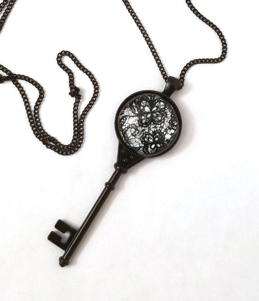 Black Metal Skeleton Key pendant necklace with Fused Glass Silver Lace cabochon on 24 inch black chain jewelry seeds glassworks seedsglassworks