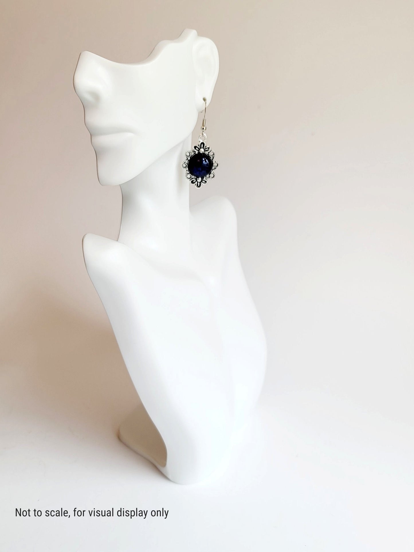 Silver tone flower earrings with  dichroic dark blue fused glass  cabo pierced style