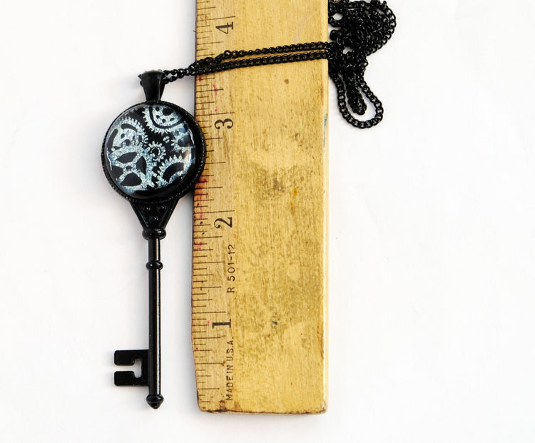 Steampunk Beauty: Black Metal Skeleton Key Pendant with Fused Glass Silver Gears Cabochon Necklace on 24 inch black chain seeds glassworks seedsglassworks