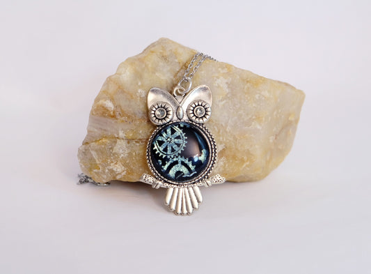 Steampunk Owl pendant necklace, silver tone  with silver gears on black dichroic fused glass center stone on an 20 inch steel chain