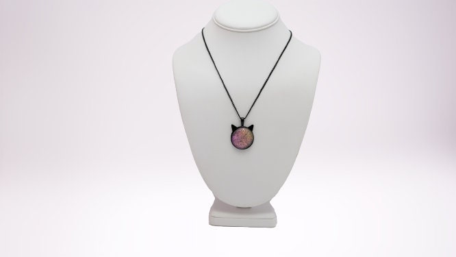 Magical Black Cat Pendant Necklace with pink/green Color-Shifting Dichroic Glass Center Stone on 20 in black chain