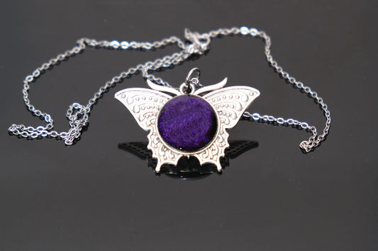 Butterfly pendant necklace, silver tone with dark purple dichroic fused glass center stone on a 20 inch steel chain