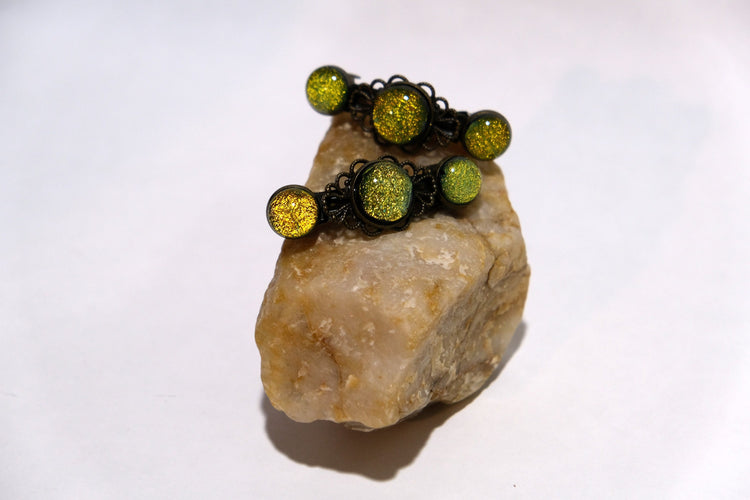 Barrette pair, bronze flowers with yellow/green dichroic fused glass cabochons, french clip, 2 1/4 inches