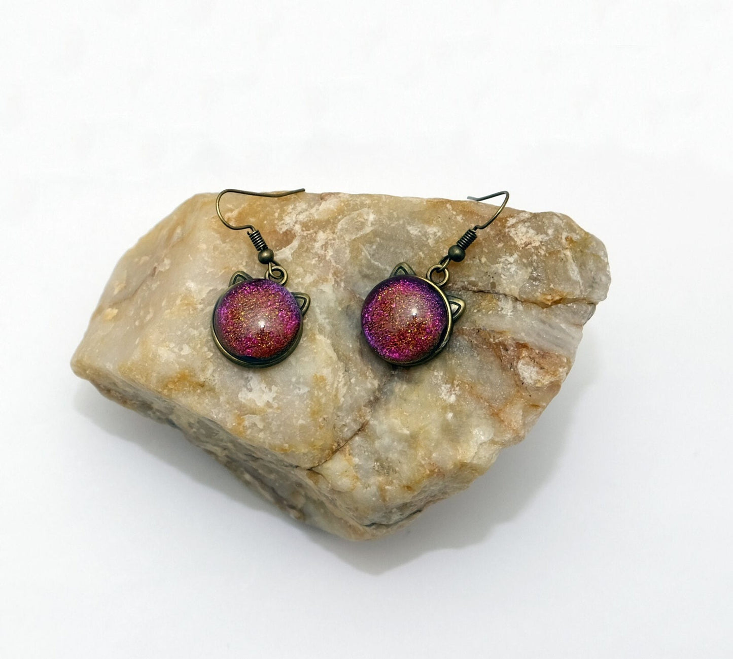 Whimsical Cat Head Shaped Pierced Earrings - Brass Tone with pinkish orange Dichroic Glass