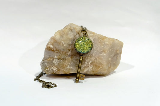 Antiqued Brass Small  Skeleton Key with Fused Glass Green Dichroic cabochon on 24 inch brass plated chain