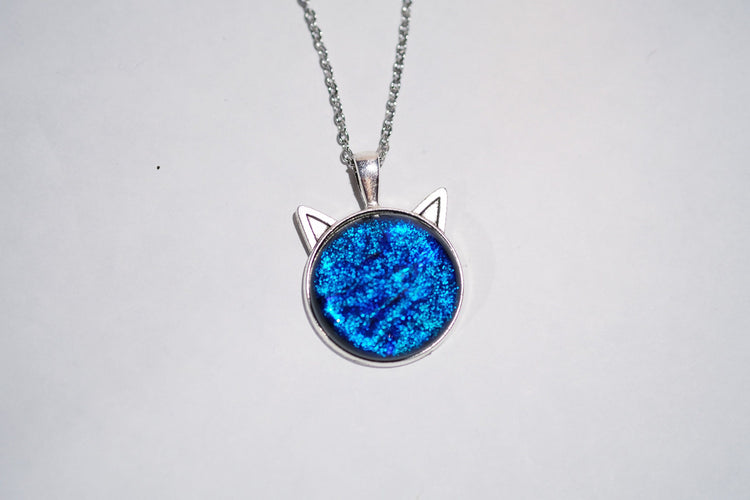 Silver Cat pendant necklace, with blue sparkling dichroic fused glass center stone on a 20 inch steel chain