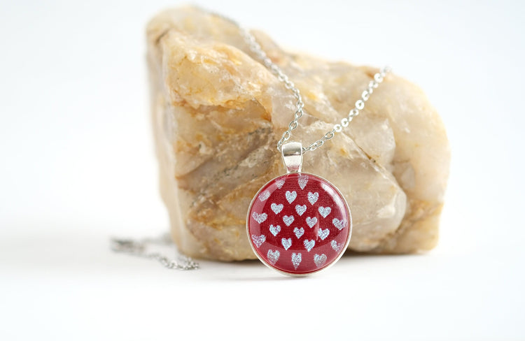 Silver tone  pendant necklace with Fused Glass Red with dichroic hearts pattern cabochon on 24 inch steel chain jewelry