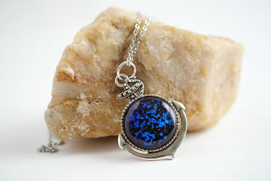 Silver Anchor pendant necklace, with blue and black sparkling dichroic fused glass center stone on a 20 inch steel chain