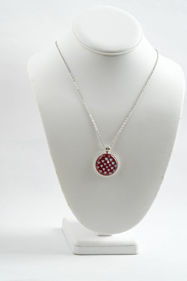 Silver tone  pendant necklace with Fused Glass Red with dichroic hearts pattern cabochon on 24 inch steel chain jewelry