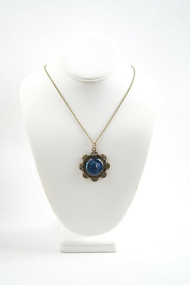 Antiqued Brass Flowered pendant necklace with Fused Glass multicolor/blue Dichroic cabochon on 24 inch antiqued brass chain jewelry.