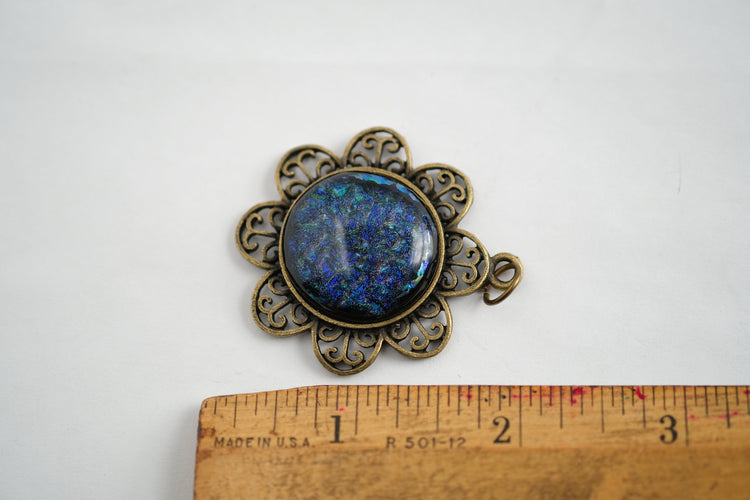 Antiqued Brass Flowered pendant necklace with Fused Glass multicolor/blue Dichroic cabochon on 24 inch antiqued brass chain jewelry.