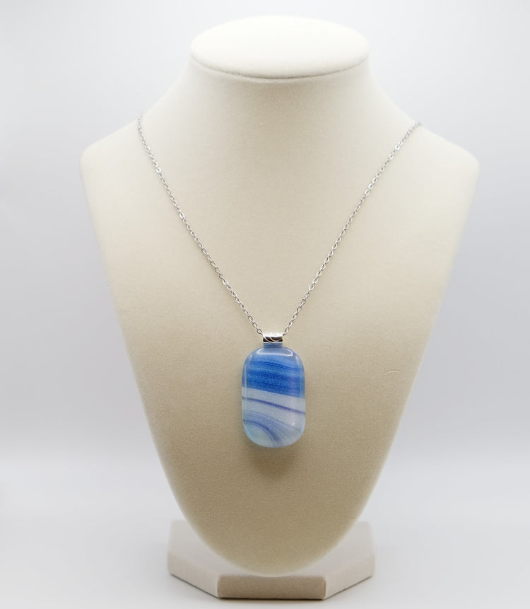 Blue and White sparkly swirl fused glass pendant statement necklace on 24 inch steel chain. 1.75 x 1 inch pendant. sliver tone bail seeds glassworks seedsglassworks