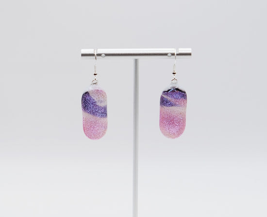 Dichroic pink, purple and white sparkling fused glass pierced dangling earrings on silver french wires. Approx 2 inches total length seeds glassworks seedsglasswork