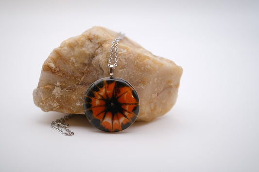 Tie Dye look Halloween fused glass pendant necklace jewelry in black, white and orange on 20 inch steel chain seeds glassworks seedsglassworks