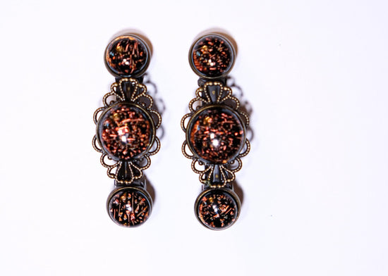 Barrette pair, bronze flowers with dark orange dichroic fused glass cabochons, french clip, 2 1/4 inches seeds glassworks seedsglassworks