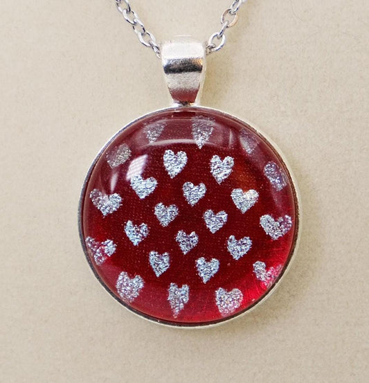 Silver tone  pendant necklace with Fused Glass Red with dichroic hearts pattern cabochon on 24 inch steel chain jewelry seeds glassworks seedsglassworks